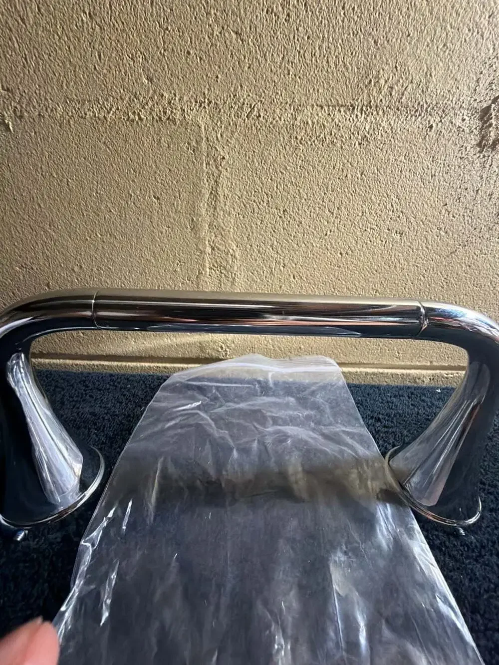 Delta Kayra Pivoting Toilet Paper Holder in Chrome  8”